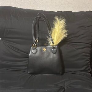 Elegant Black Handbag with Feather Accent